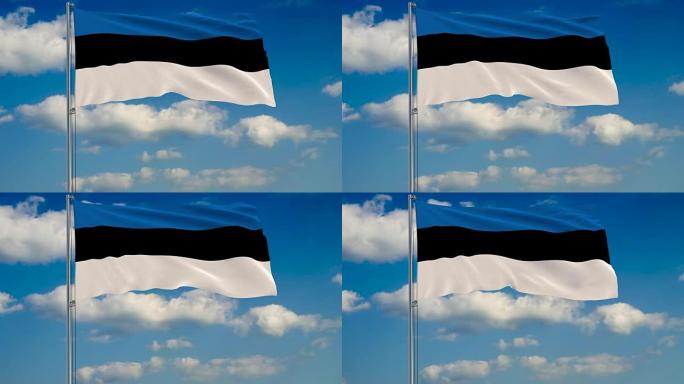 爱沙尼亚国旗映衬着漂浮在蓝天上的云朵