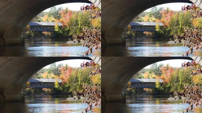 4K 60p在新罕布什尔州由桥拱构架的henniker廊桥的特写镜头