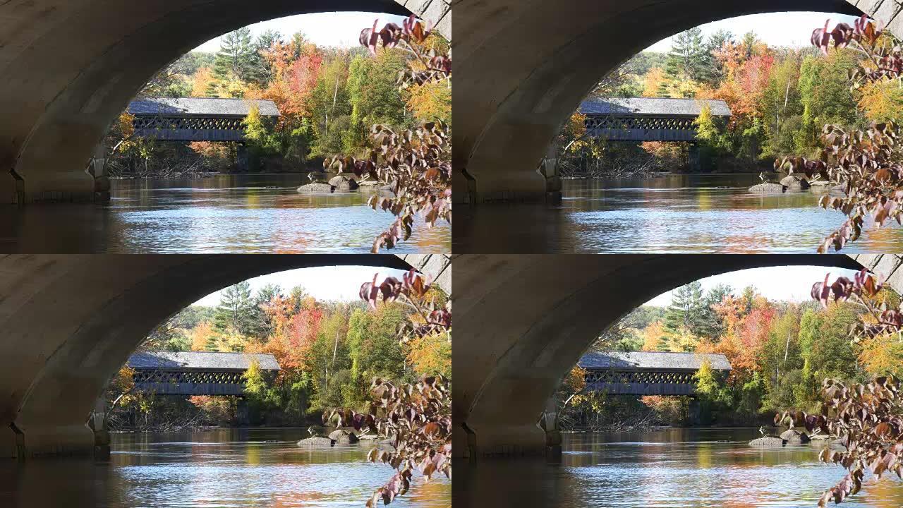 4K 60p在新罕布什尔州由桥拱构架的henniker廊桥的特写镜头