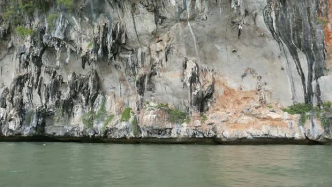 夏季泰国攀牙湾国家公园沿海地区的石灰岩山崖，用于环境，放松，旅行，旅行，季节和气候变化概念