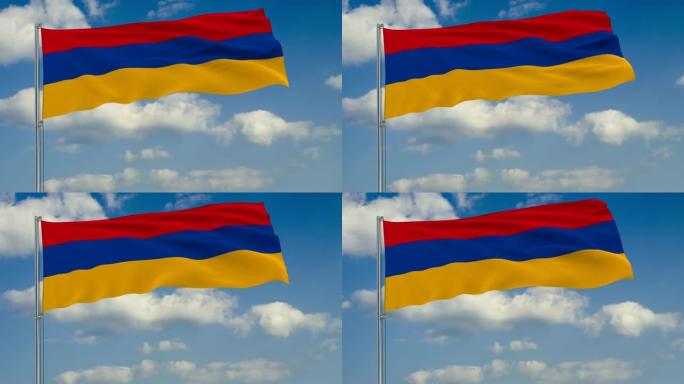 蓝色天空中飘浮着白云的亚美尼亚国旗