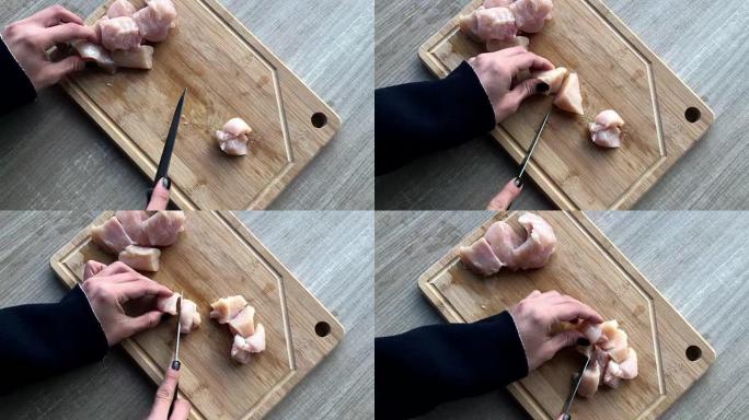 女性手工切割鸡胸肉