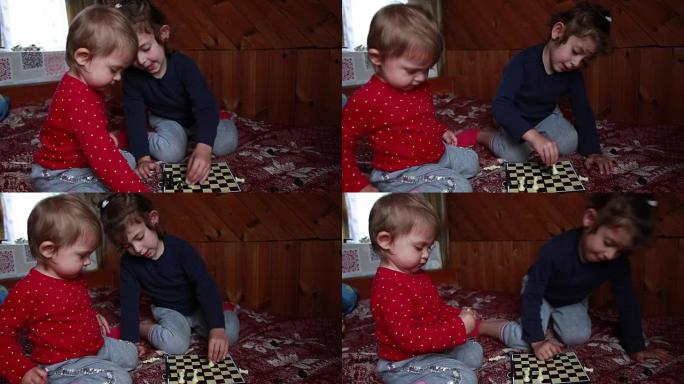 两个小女孩在棋盘上排列棋子