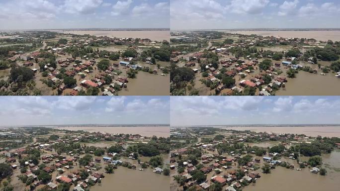 无人机视图: 季风降雨期间被洪水淹没的村庄的滑块镜头
