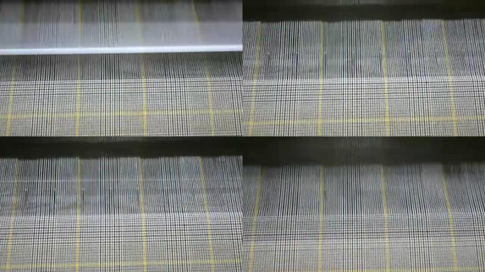 纺织厂织机织机上的彩线