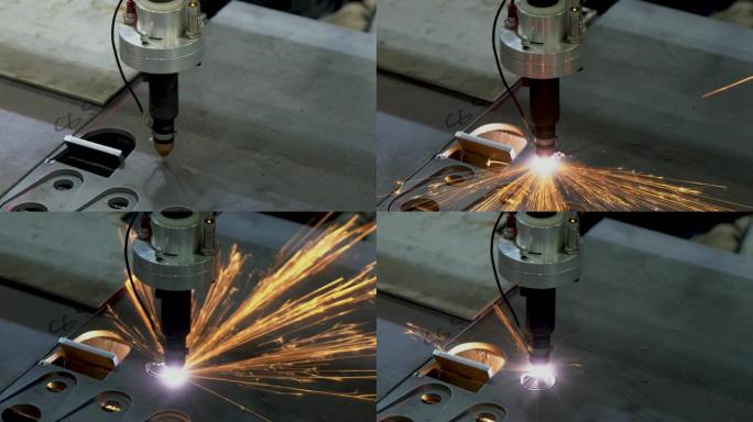 光纤激光切割机用火花灯切割金属板。高科技制造概念。