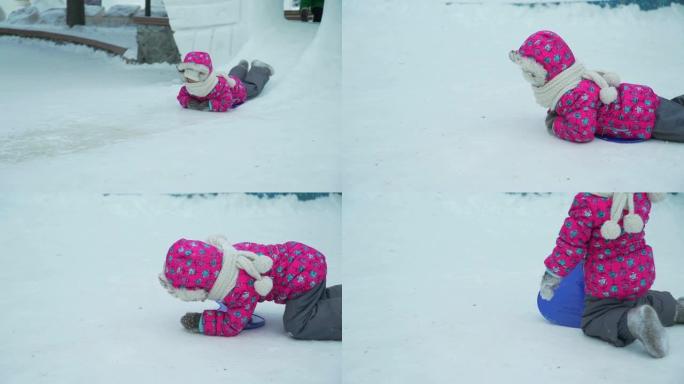 小女孩骑小冰滑梯