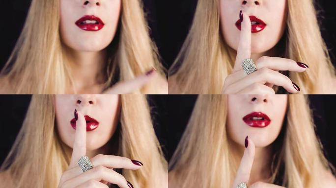 奢华的女孩和黄金珠宝。钻石戒指。红色唇膏。