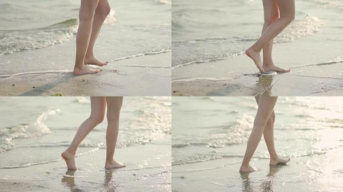 海浪中的女性腿。女人腿在水上行走的特写镜头，慢动作