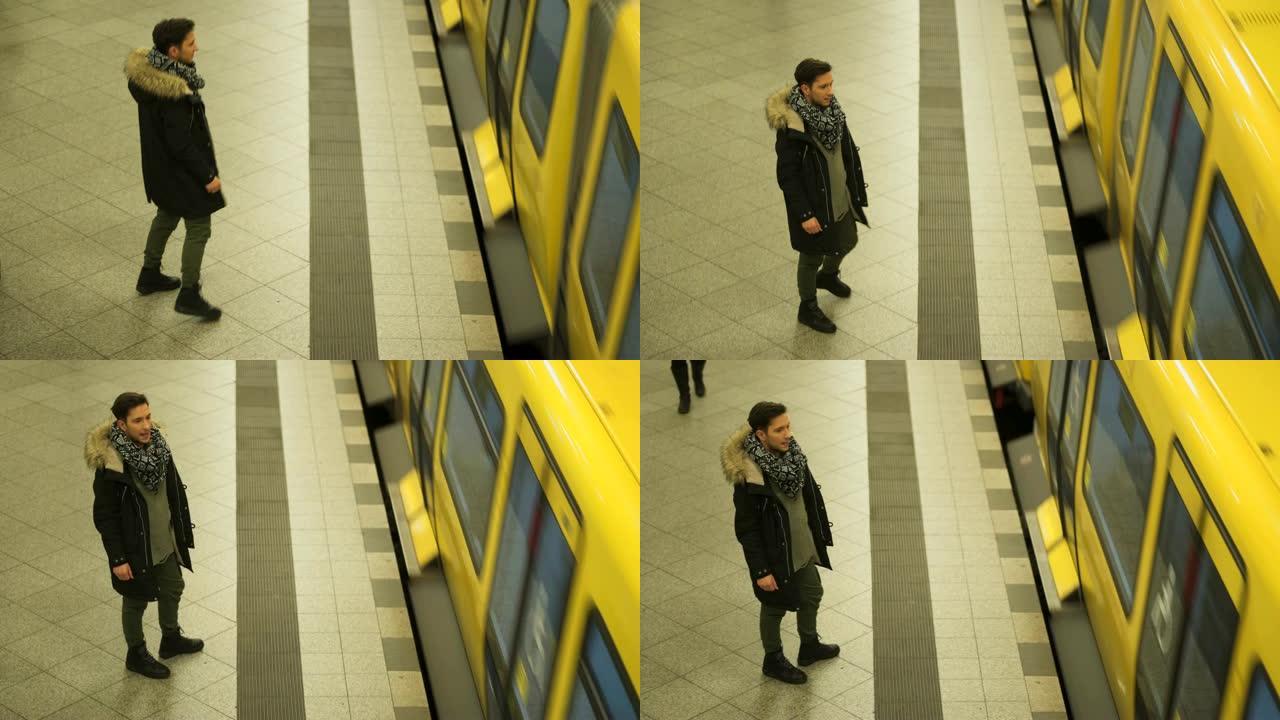 无聊的人在地铁里等着他