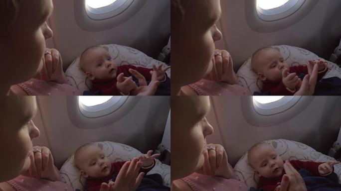 母亲和她的婴儿在飞机上发冷