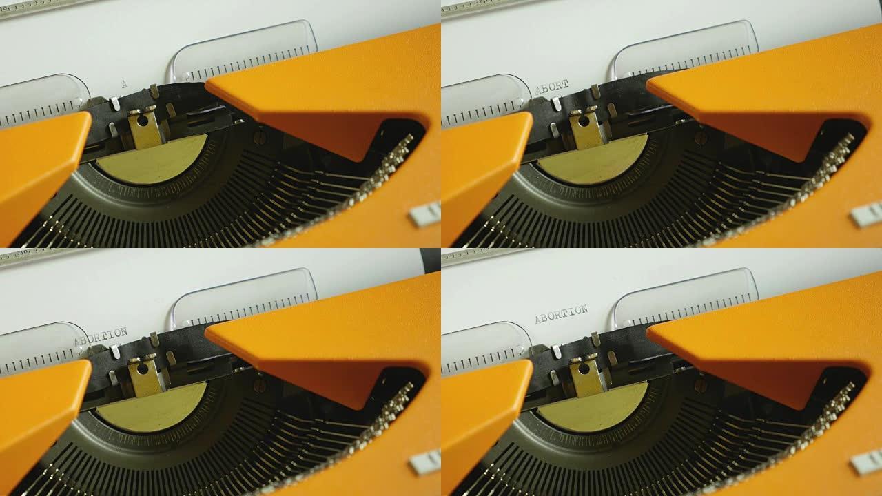 一个人在旧打字机上写流产的高角度镜头，声音