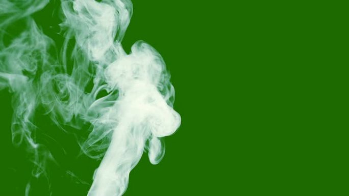 绿色背景上轻烟或蒸汽的流动