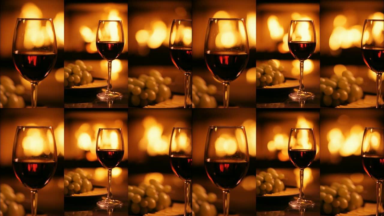 壁炉背景上一个红酒酒杯的垂直视频。