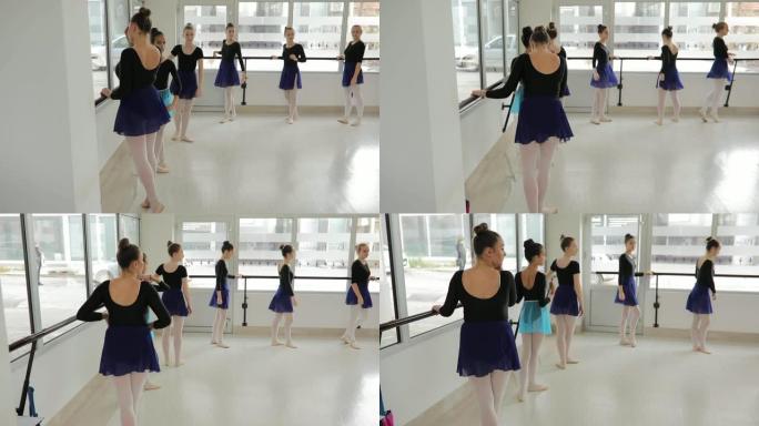 年轻的芭蕾舞演员开始上课