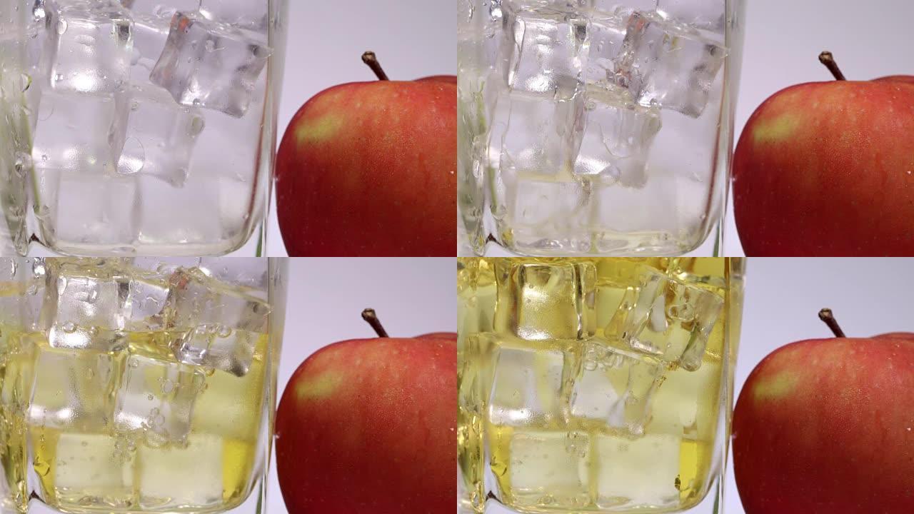 流过磨砂玻璃冰块的苹果汁