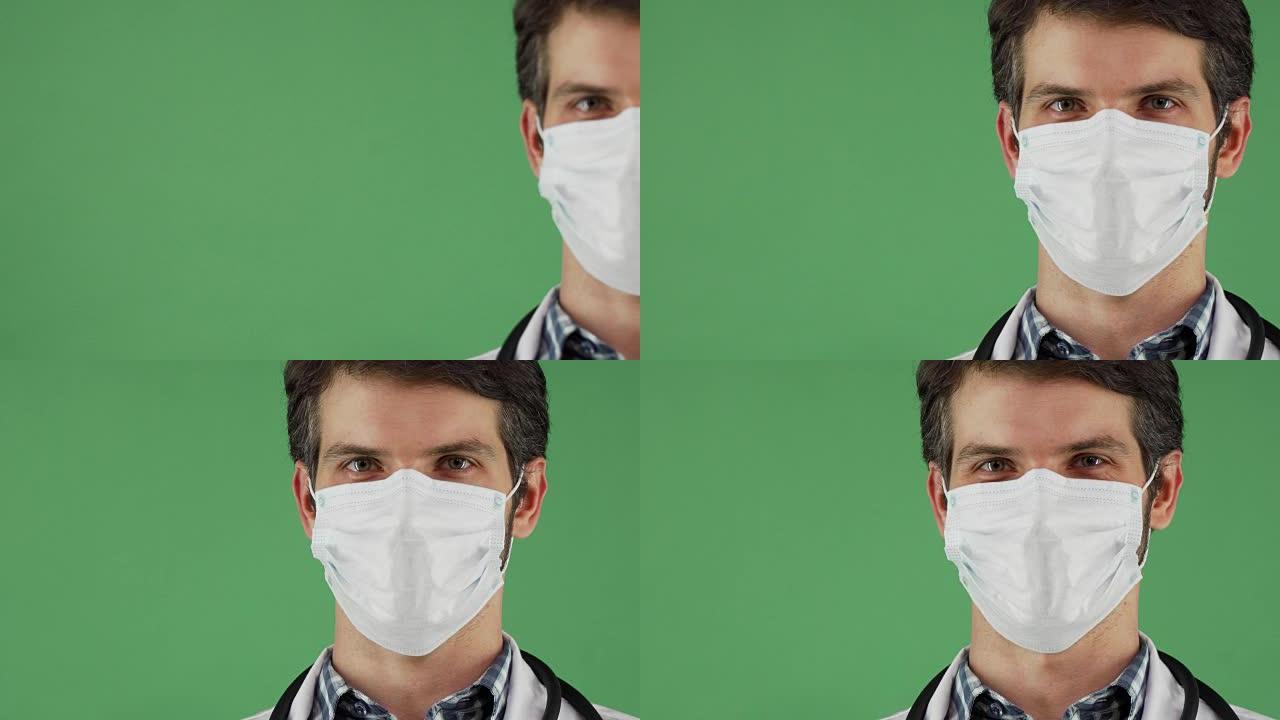 戴医用口罩的男医生喜笑颜开
