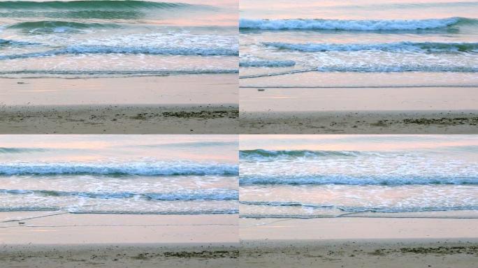 海浪在白色沙滩上滚动的镜头
