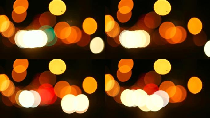 傍晚的城市交通与模糊的大灯流动