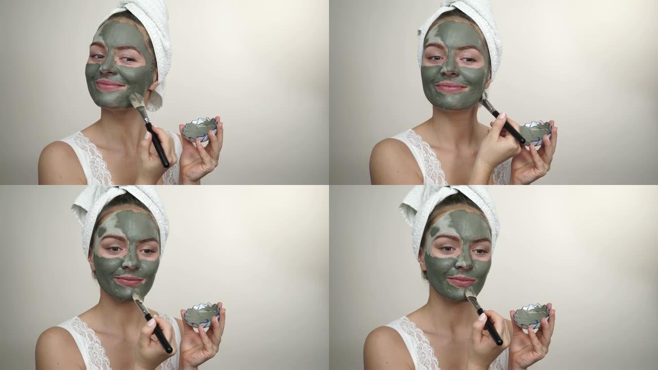 脸上有绿色粘土泥面具的女人4K