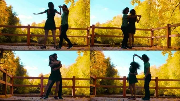 年轻的专业夫妇在桥上跳舞的剪影