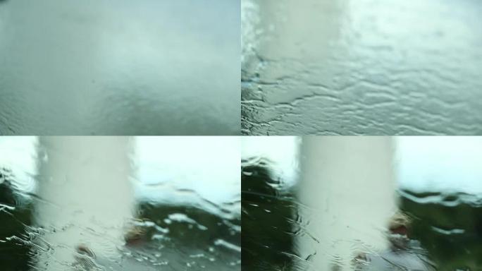 用120fps慢动作的水压软管冲洗挡风玻璃。乘客视点