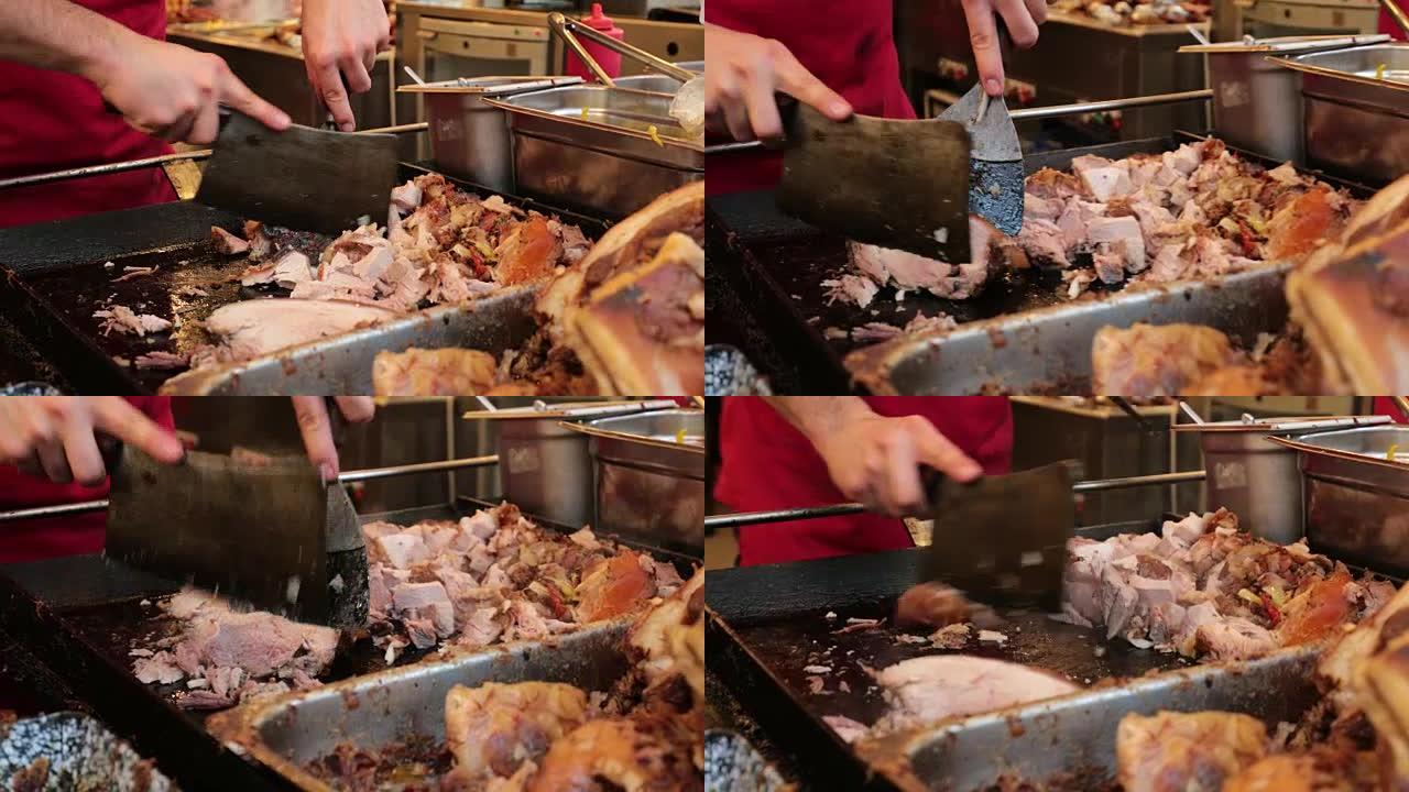 屠夫用大刀割肉。4k食品市场上人手切片和切肉分类的特写