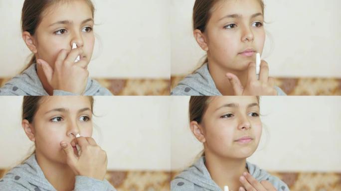 十几岁的女孩喷入鼻子喷雾