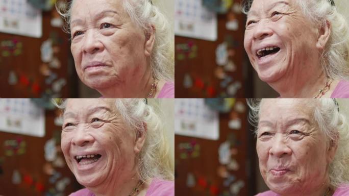 美丽的亚洲高级女性肖像，积极的情感。