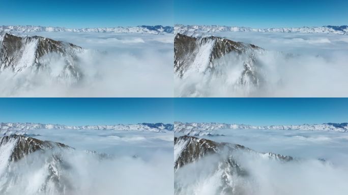 蓝天下美丽雪山风景云海山脊自然风光