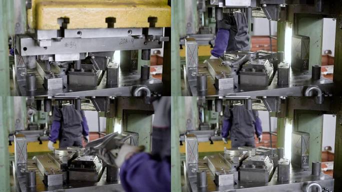 压榨生产。机器零件是使用钢板模具生产的。车辆悬架零件