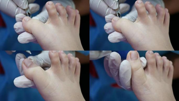美容师的足部水疗和指甲延伸程序