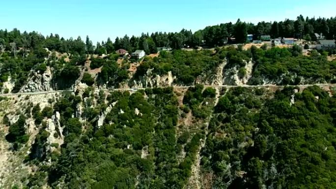 无人机从加州圣贝纳迪诺箭头湖附近的山的一侧发射出来