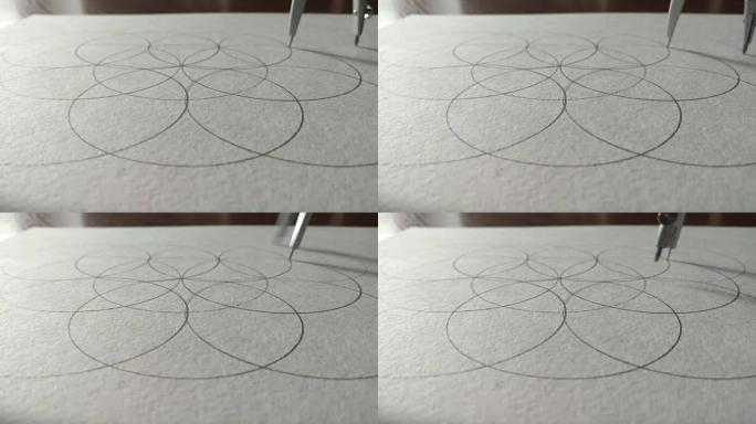 圆规在一张纸上画一个圆