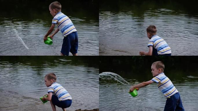 小男孩尖叫着，愤怒地把水桶里的水倒进河里。儿童在大自然中玩耍