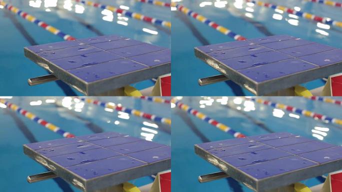 游泳池跳水板的特写视图。