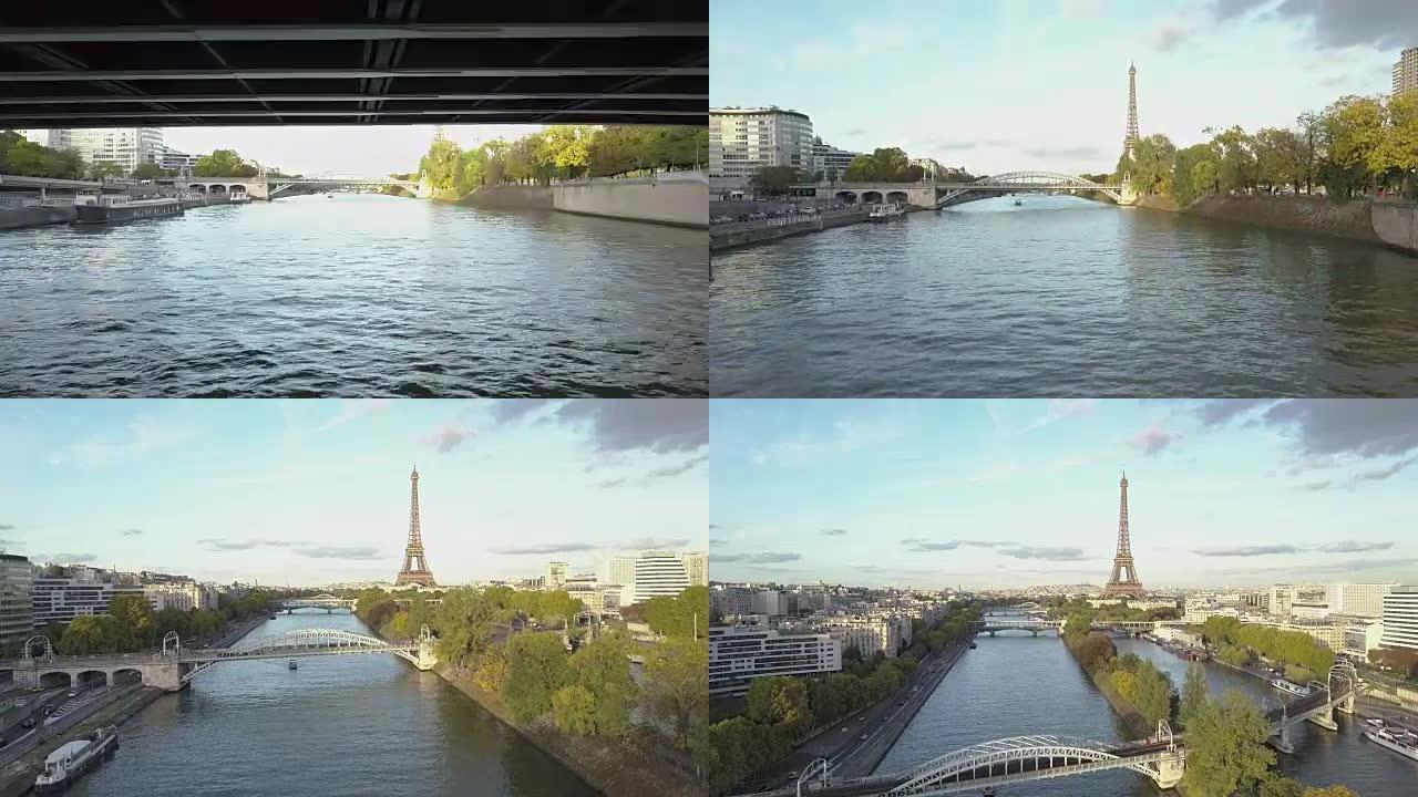 无人机镜头经过桥下，向上展示巴黎的塞纳河和埃菲尔铁塔
