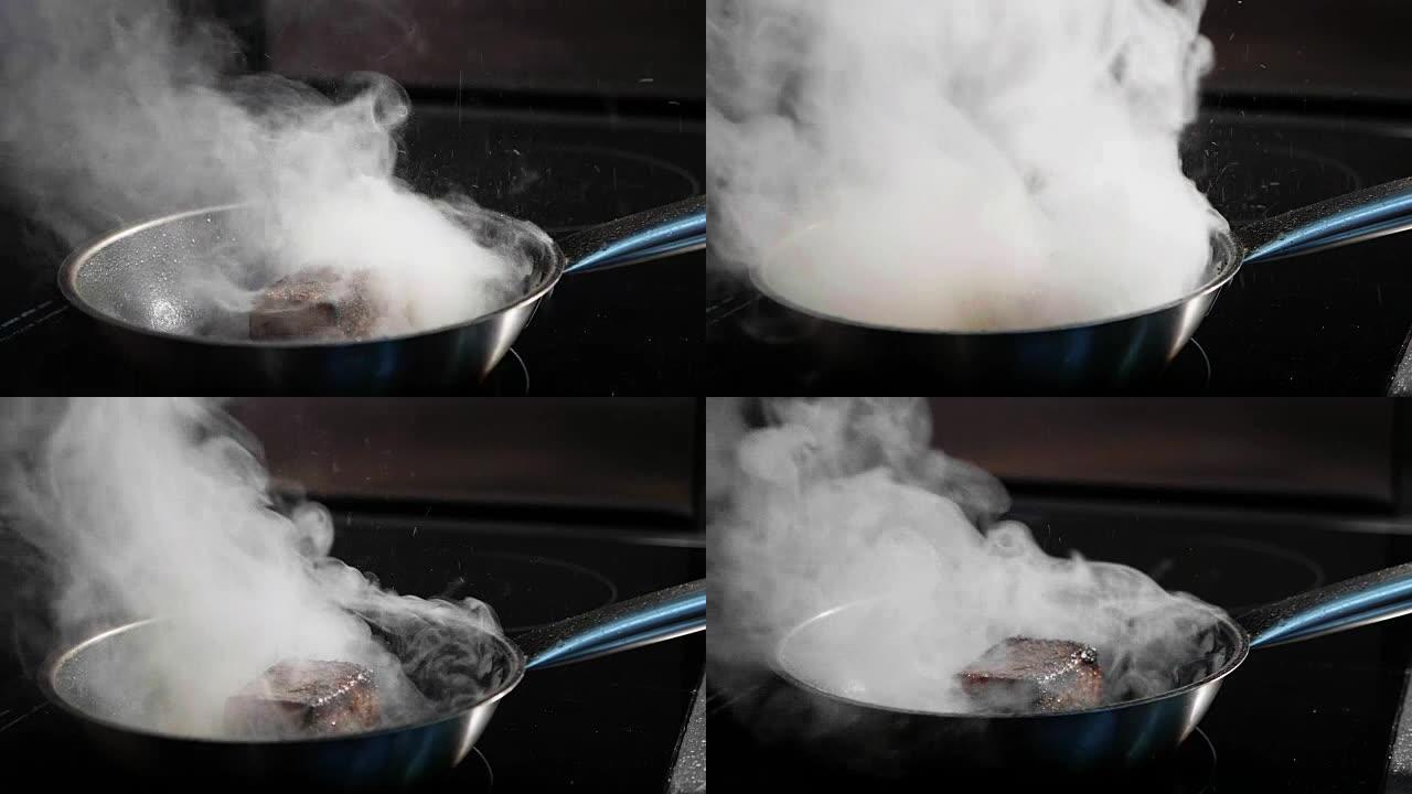 煎鱼，马林鱼片在慢动作的蒸锅上。