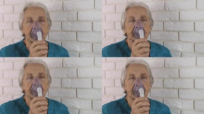 一个有吸入器的老妇人。