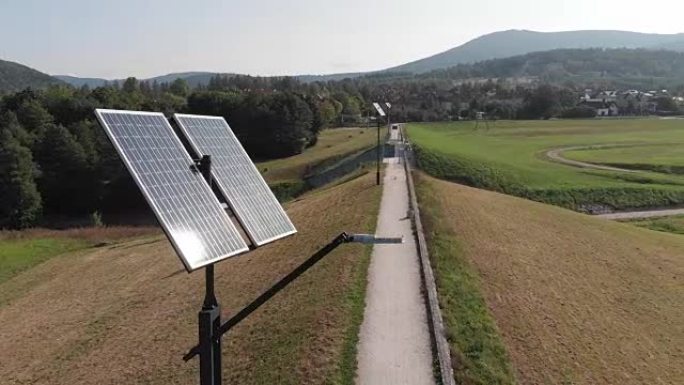 太阳能电池板绿色发电。摄像机在太阳能电池板周围缓慢旋转