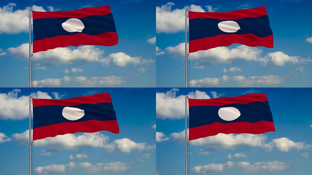 蓝色天空中飘浮的云朵映衬着老挝国旗