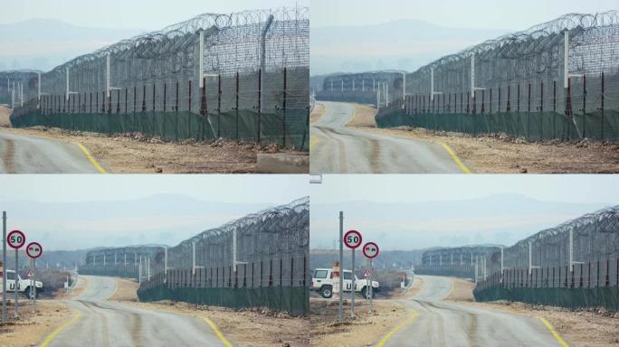 叙利亚和以色列的边界。带有军事哨所和联合国士兵的高栅栏