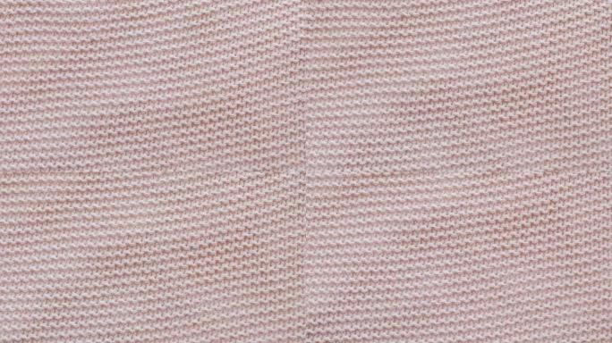 针织面料的粉色纹理。