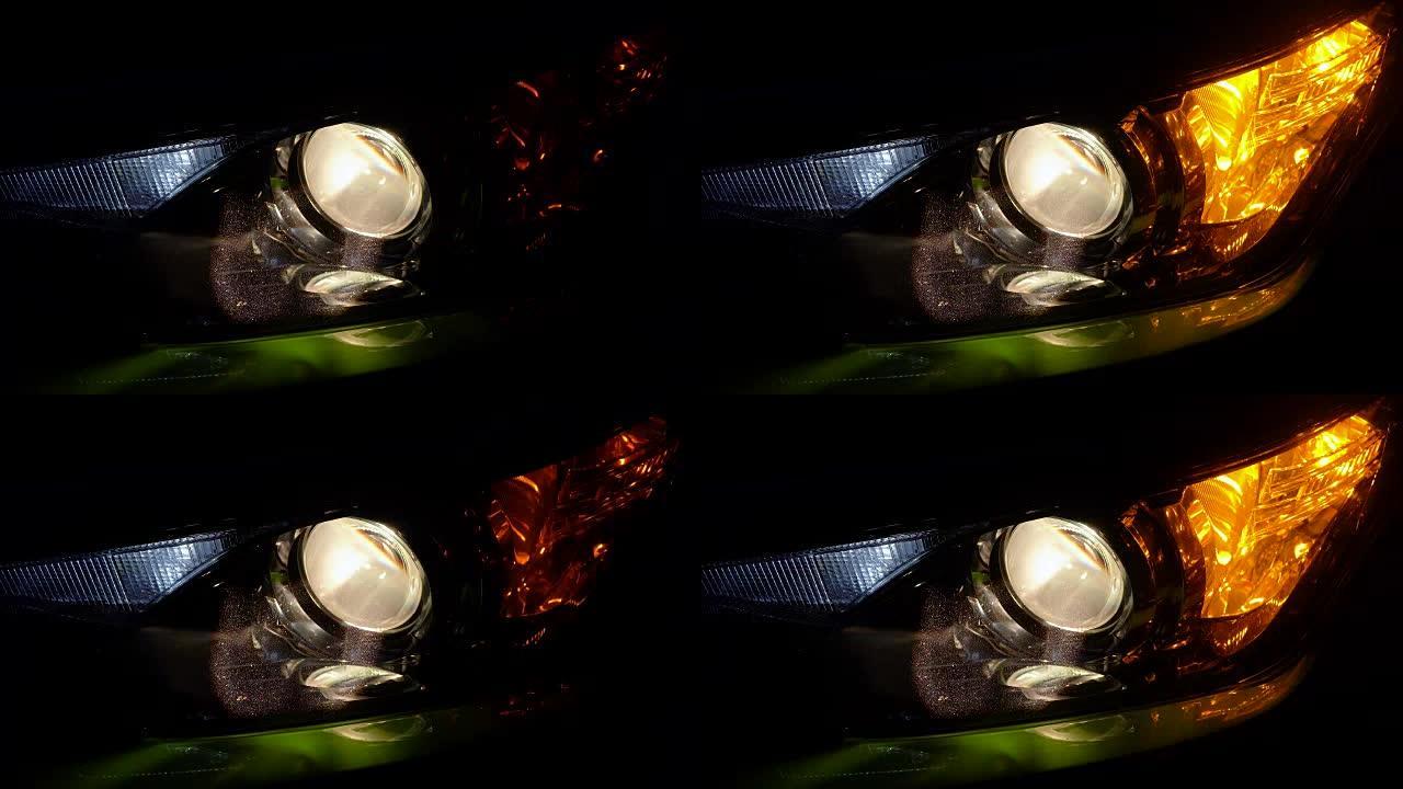 现代绿色豪华车夜间带近光灯和转向灯或闪光灯。