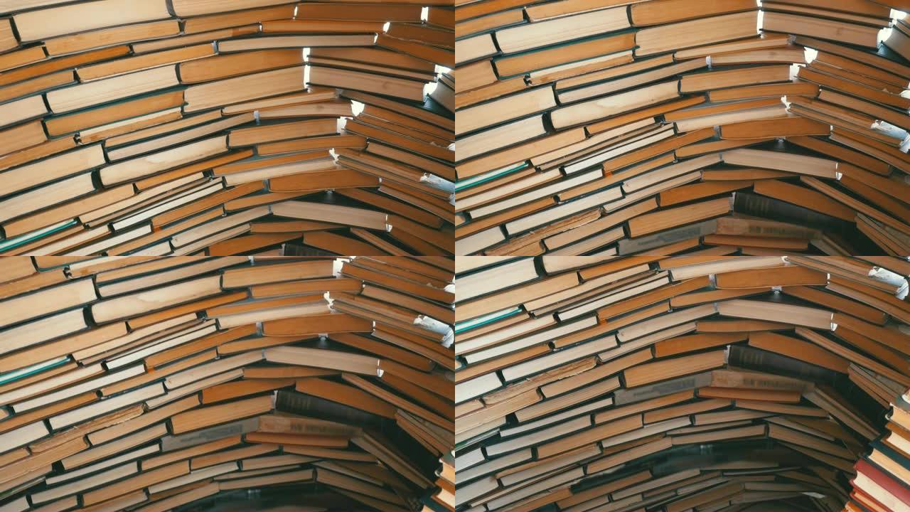 成堆的书漂亮地堆成一排