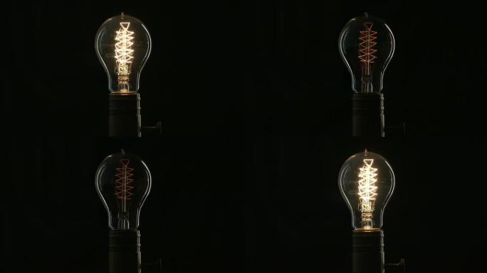 爱迪生的灯泡从电流中缓慢点亮