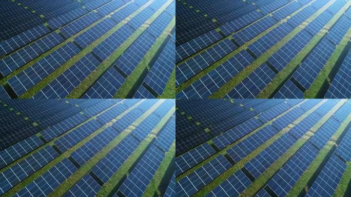 带照明的太阳能电池板农场 (太阳能电池) 的4k镜头鸟瞰图