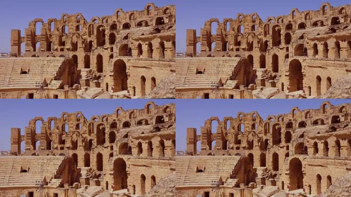 El Jem圆形剧场的历史遗迹，鸟儿飞过。锁定射击。