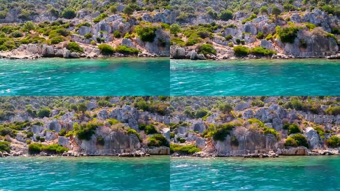 德姆雷·凯科娃土耳其群岛-2018年7月30日-深蓝色的海，绿岛，德姆雷岛，凯科娃岛。从海里看夏日，