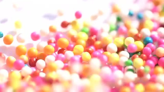 彩色糖果球堆叠在运动中